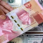 Ilustrasi mata uang rupiah dan Dolar AS-1641557959