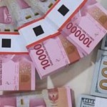 Mata uang rupiah dan dolar AS-1648808188