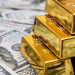 Ilustrasi uang dan emas/ist-1670485673